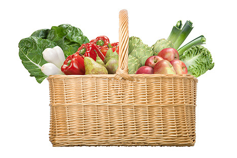 Picture of a real basket filled with fruit and vegetables. Among the products are Swiss chard, onions, peppers, pears, artichokes, apples, celery and lettuce.