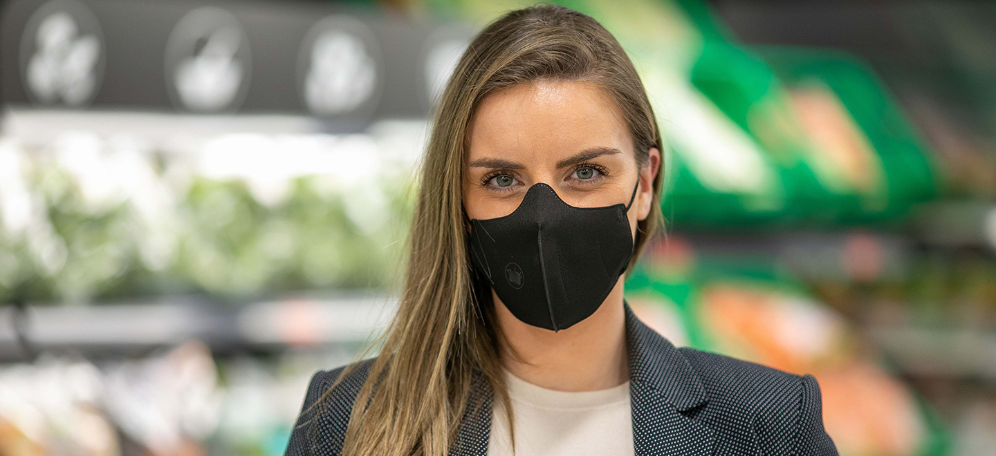 Ana Alves, factory coordinator of a supermarket in Porto, wearing a new corporate face mask