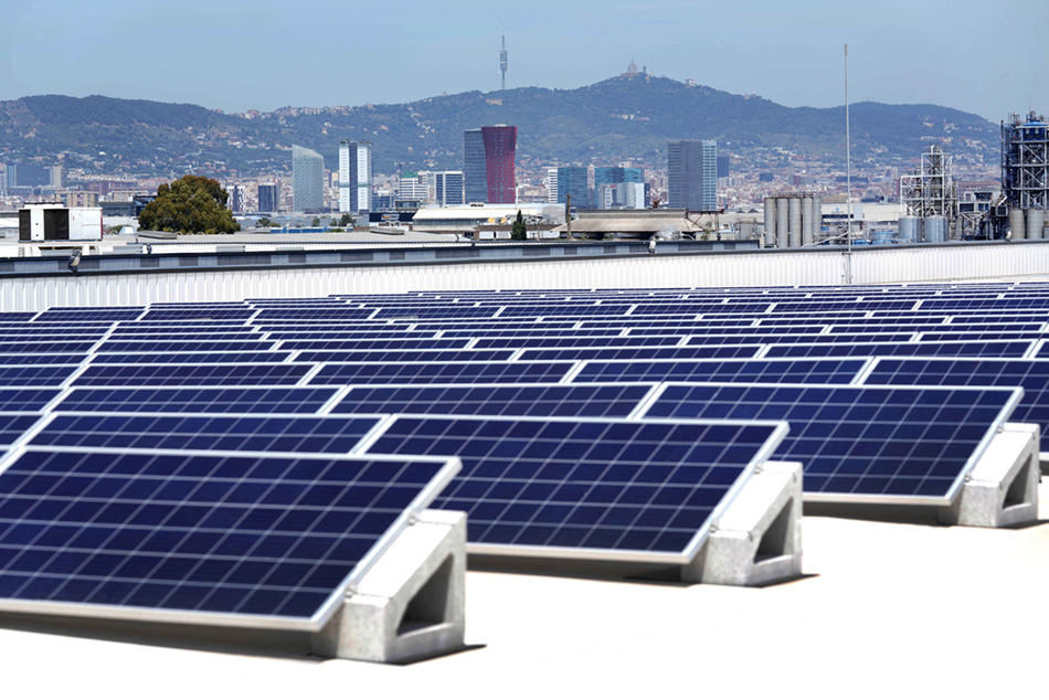 Solar panels on online shopping warehouse roof located in Barcelona.